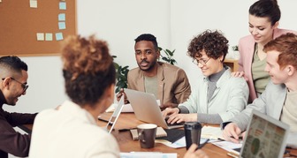 Group of People Gathering In a Workshop